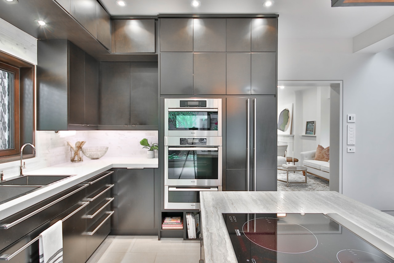 Custom carpentry fit-out with stone benchtop and bespoke cabinetry